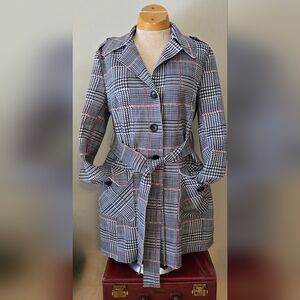 Solitaire single breasted trench coat. Size small. Black and red pattern. NWOT